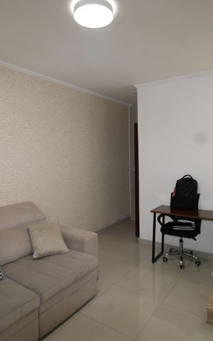 Casa à venda com 98m², 3 quartos e 2 vagasSala