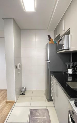 Apartamento à venda com 45m², 2 quartos e 1 vaga Apartamento à venda com 45m², 2 quartos e 1 vagaCozinha e Área de Serviço