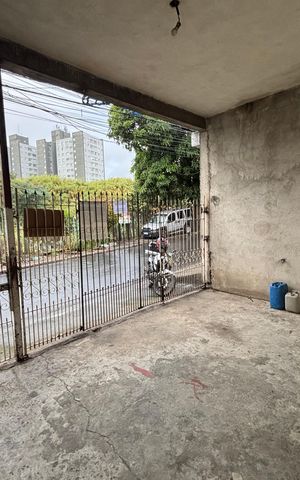 Casa à venda com 210m², 6 quartos e 1 vaga Casa à venda com 210m², 6 quartos e 1 vagaGaragem