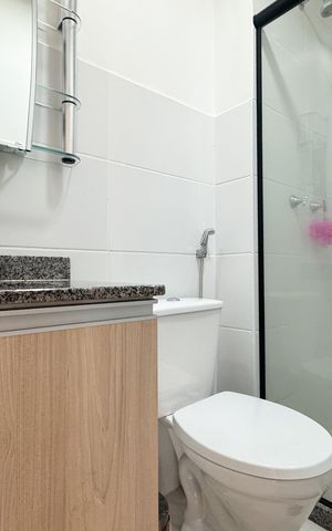 Apartamento à venda com 56m², 2 quartos e 1 vaga Apartamento à venda com 56m², 2 quartos e 1 vagaBanheiro Social
