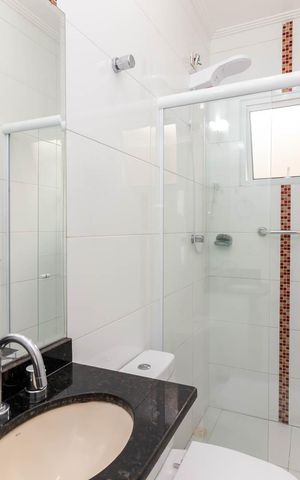 Casa de condomínio à venda com 72m², 2 quartos e 2 vagasBanheiro da Suíte 1