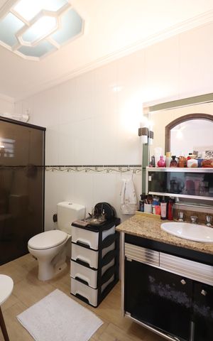 Casa à venda com 228m², 3 quartos e 6 vagasBanheiro da Suíte