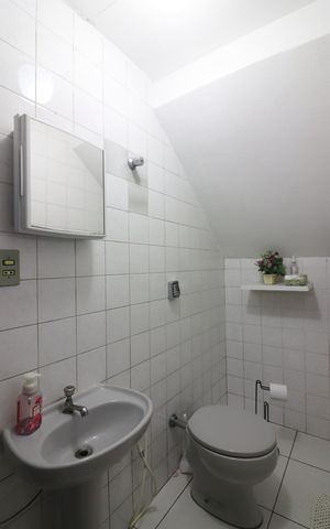 Casa à venda com 228m², 3 quartos e 6 vagasLavabo da Garagem