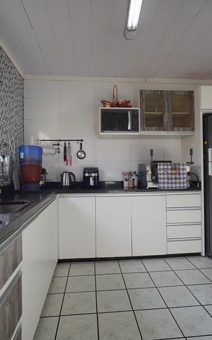 Casa para alugar com 130m², 2 quartos e 1 vagaCozinha