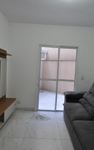 Casa de condomínio à venda com 48m², 2 quartos e 1 vagaSala