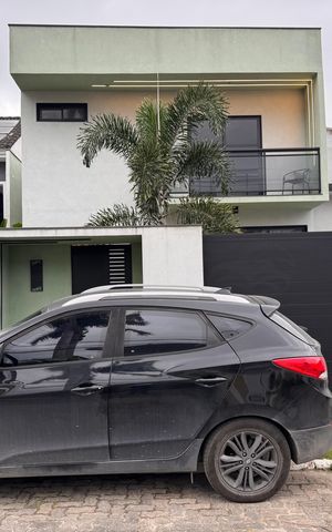Casa de condomínio à venda com 160m², 4 quartos e 1 vaga Casa de condomínio à venda com 160m², 4 quartos e 1 vagaFachada