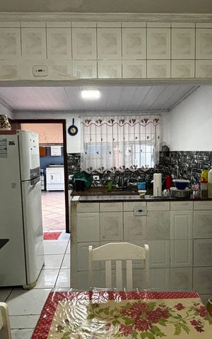 Casa à venda com 108m², 2 quartos e 2 vagas Casa à venda com 108m², 2 quartos e 2 vagasCozinha