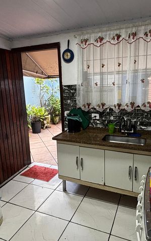 Casa à venda com 108m², 2 quartos e 2 vagas Casa à venda com 108m², 2 quartos e 2 vagasCozinha