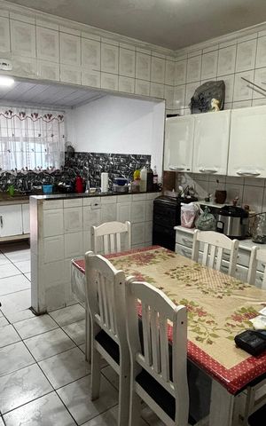 Casa à venda com 108m², 2 quartos e 2 vagas Casa à venda com 108m², 2 quartos e 2 vagasCozinha