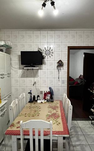 Casa à venda com 108m², 2 quartos e 2 vagas Casa à venda com 108m², 2 quartos e 2 vagasCozinha