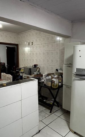 Casa à venda com 108m², 2 quartos e 2 vagas Casa à venda com 108m², 2 quartos e 2 vagasCozinha