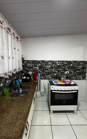 Casa à venda com 108m², 2 quartos e 2 vagas Casa à venda com 108m², 2 quartos e 2 vagasCozinha
