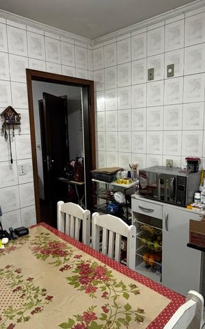 Casa à venda com 108m², 2 quartos e 2 vagas Casa à venda com 108m², 2 quartos e 2 vagasCozinha