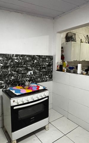 Casa à venda com 108m², 2 quartos e 2 vagas Casa à venda com 108m², 2 quartos e 2 vagasCozinha
