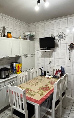 Casa à venda com 108m², 2 quartos e 2 vagas Casa à venda com 108m², 2 quartos e 2 vagasCozinha