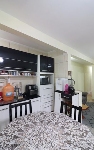 Casa à venda com 125m², 4 quartos e 2 vagasSala/Cozinha