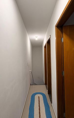 Apartamento à venda com 111m², 3 quartos e 1 vaga Apartamento à venda com 111m², 3 quartos e 1 vagaCorredor acesso aos quartos