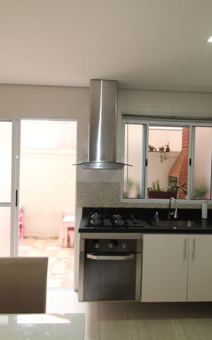 Casa de condomínio à venda com 100m², 2 quartos e 2 vagasSala / Cozinha