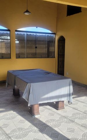 Casa à venda com 239m², 4 quartos e 2 vagas Casa à venda com 239m², 4 quartos e 2 vagasÁrea externa