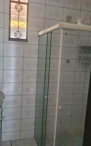 Casa à venda com 239m², 4 quartos e 2 vagas Casa à venda com 239m², 4 quartos e 2 vagasBanheiro