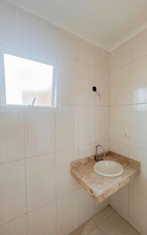 Casa de condomínio à venda com 71m², 2 quartos e 1 vagaBanheiro da Suíte 1