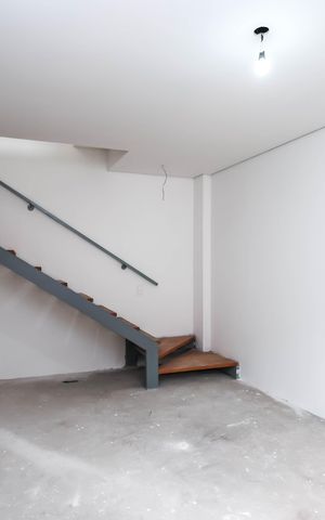 Casa à venda com 65m², 1 quarto e 2 vagasSala e Cozinha