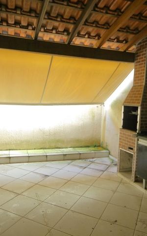 Casa de condomínio à venda com 117m², 3 quartos e 1 vagaQuintal/Churrasqueira 