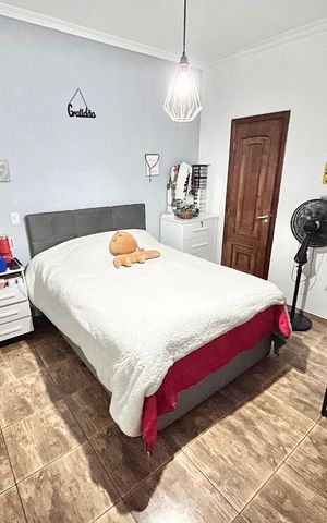 Casa à venda com 216m², 4 quartos e 2 vagasQuarto Suíte