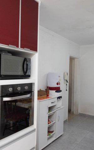Casa à venda com 90m², 3 quartos e 2 vagas Casa à venda com 90m², 3 quartos e 2 vagasCozinha