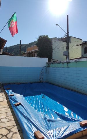 Casa de condomínio à venda com 213m², 3 quartos e 1 vagaQuintal