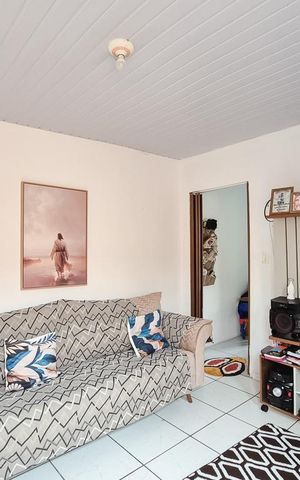 Casa à venda com 150m², 2 quartos e 2 vagas Casa à venda com 150m², 2 quartos e 2 vagasSala