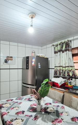 Casa à venda com 150m², 2 quartos e 2 vagas Casa à venda com 150m², 2 quartos e 2 vagasCozinha