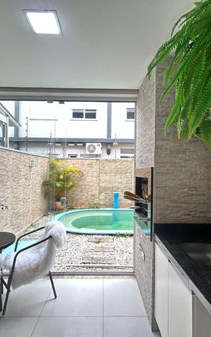 Casa à venda com 118m², 3 quartos e 2 vagas Casa à venda com 118m², 3 quartos e 2 vagasÁrea comum - Churrasqueira