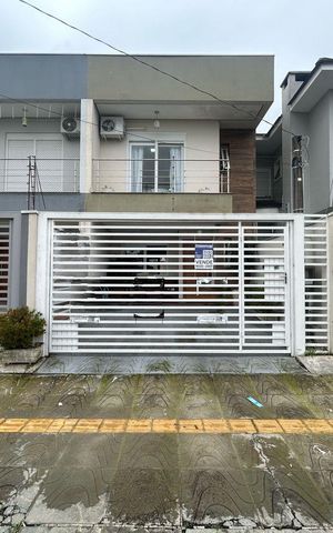 Casa à venda com 118m², 3 quartos e 2 vagas Casa à venda com 118m², 3 quartos e 2 vagasFachada