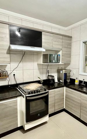 Casa à venda com 180m², 4 quartos e 4 vagas Casa à venda com 180m², 4 quartos e 4 vagasCozinha