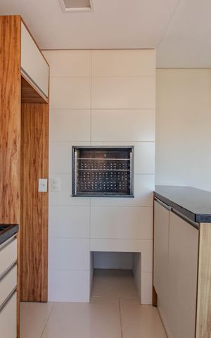 Apartamento à venda com 52m², 2 quartos e 2 vagas Apartamento à venda com 52m², 2 quartos e 2 vagasCozinha e Área de Serviço