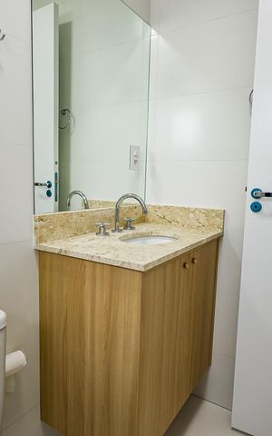 Apartamento à venda com 75m², 2 quartos e 2 vagas Apartamento à venda com 75m², 2 quartos e 2 vagasBanheiro da Suíte 1