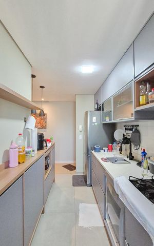 Apartamento à venda com 57m², 2 quartos e 1 vaga Apartamento à venda com 57m², 2 quartos e 1 vagaCozinha e Área de Serviço
