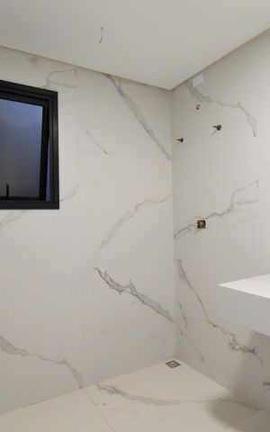Casa de condomínio à venda com 250m², 3 quartos e 2 vagasBanheiro da Suíte 2