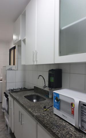 Apartamento à venda com 77m², 2 quartos e 1 vagaCozinha e Área de Serviço