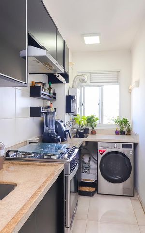 Apartamento à venda com 54m², 2 quartos e 1 vagaCozinha e Área de Serviço