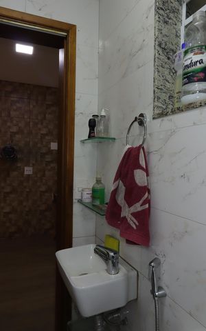 Casa à venda com 252m², 3 quartos e 4 vagasBanheiro da Área Gourmet