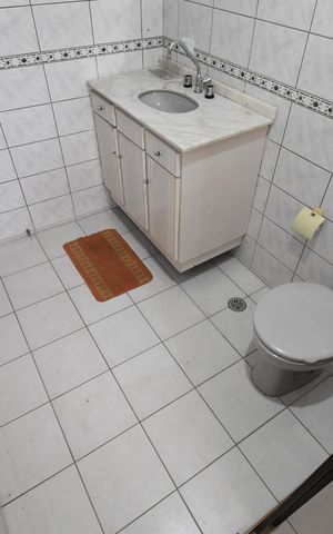 Casa à venda com 342m², 4 quartos e 4 vagasBanheiro da Suíte