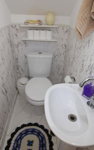 Casa de condomínio à venda com 60m², 2 quartos e 1 vagaLavabo