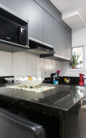 Apartamento à venda com 49m², 2 quartos e 1 vaga Apartamento à venda com 49m², 2 quartos e 1 vagaCozinha - Armários