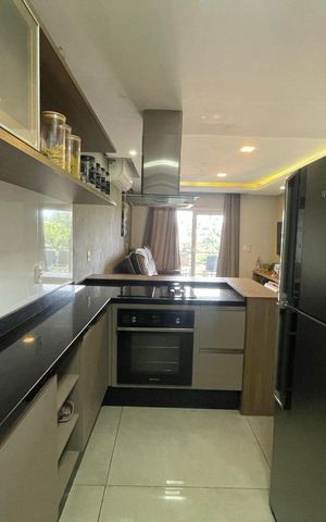 Casa à venda com 135m², 3 quartos e 3 vagas Casa à venda com 135m², 3 quartos e 3 vagasCozinha