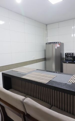 Casa para alugar com 100m², 2 quartos e 2 vagasCozinha