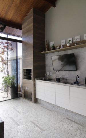 Casa de condomínio à venda com 310m², 4 quartos e 2 vagasChurrasqueira