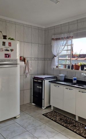 Casa à venda com 120m², 3 quartos e 3 vagas Casa à venda com 120m², 3 quartos e 3 vagasCozinha