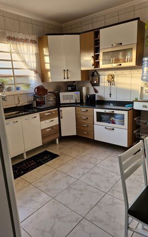 Casa à venda com 120m², 3 quartos e 3 vagas Casa à venda com 120m², 3 quartos e 3 vagasCozinha